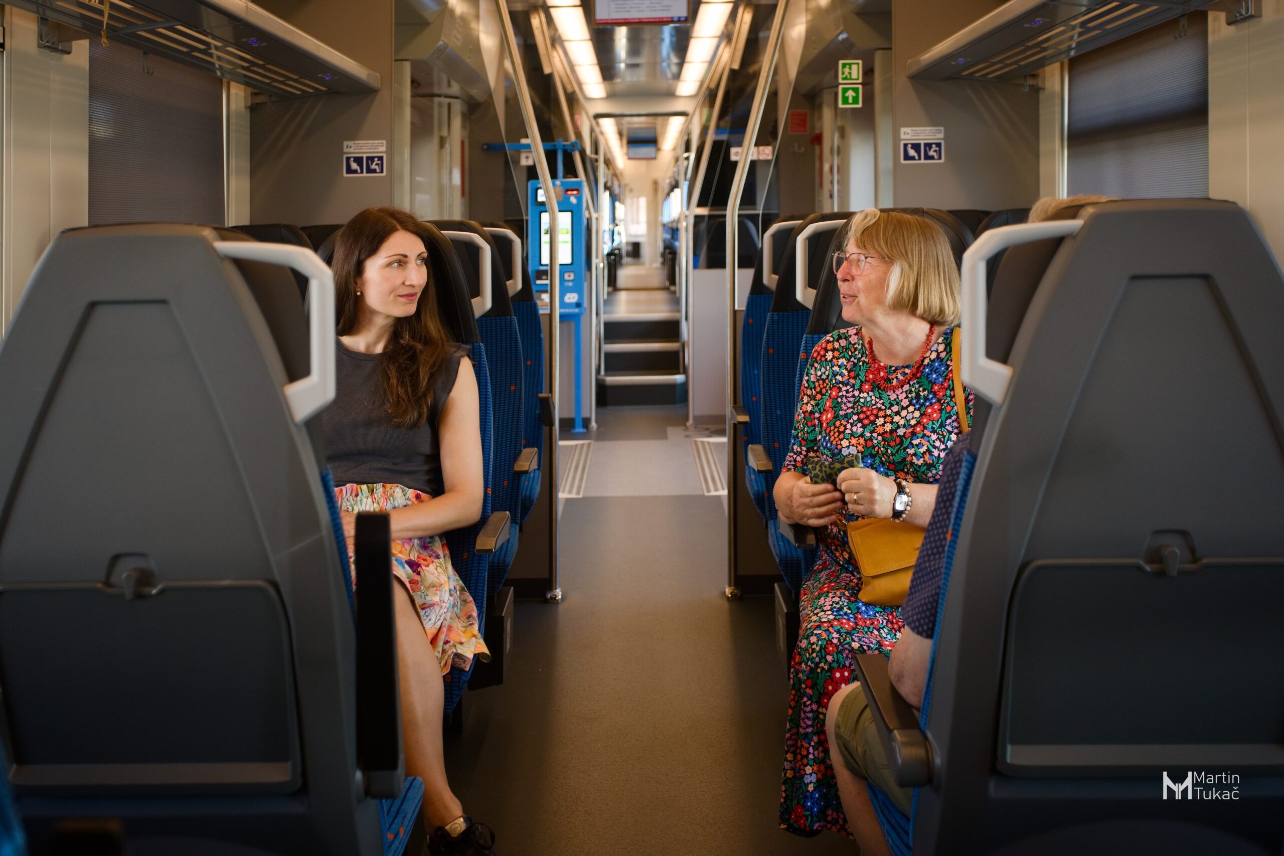 Two women talking in the train